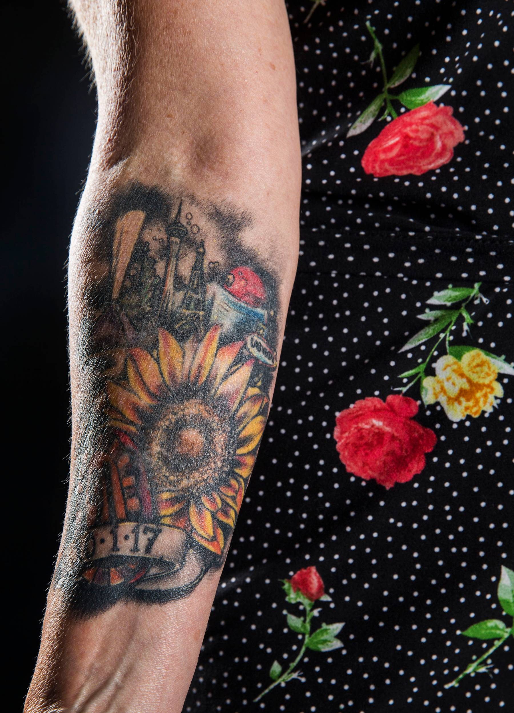 a survivor of the Route 91 Harvest Festival shooting shows their tattoos!